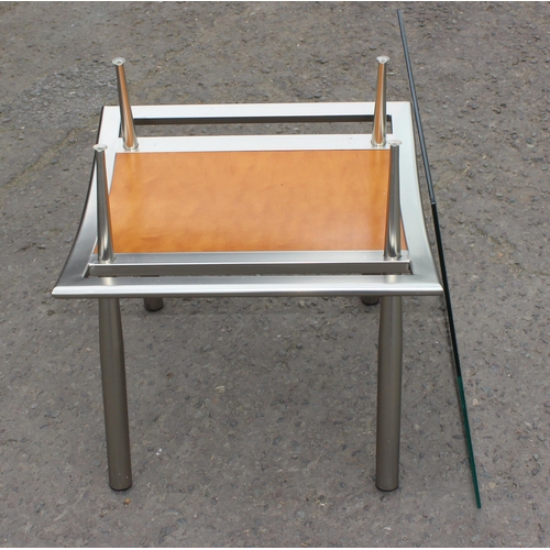 117 - A retro style chrome and glass topped table, approx 61cm square x 60cm tall