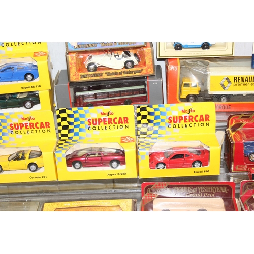 1536 - Qty of die cast model vehicles, most boxed to box to include Corgi & Maisto