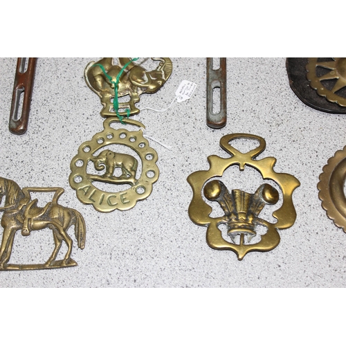 1784 - Victorian and later horse brasses, some on leather straps, horse shoe etc