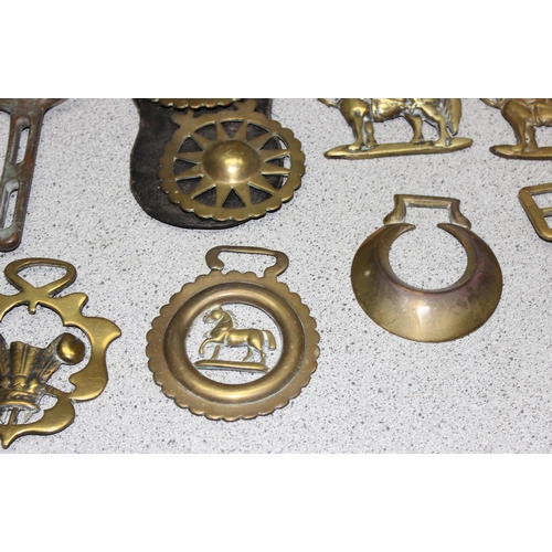 1784 - Victorian and later horse brasses, some on leather straps, horse shoe etc