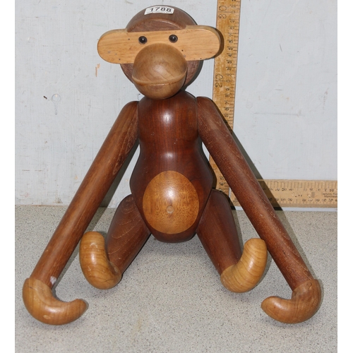 1788 - An unusual carved wooden monkey approx 46cm