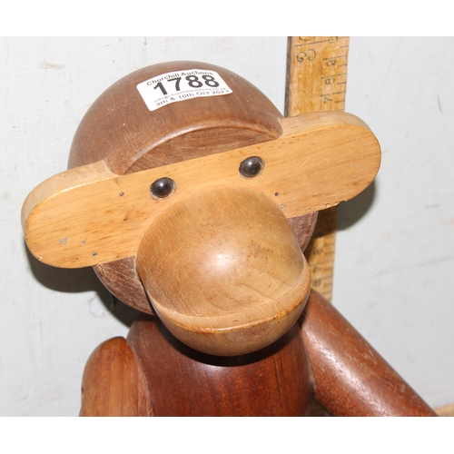 1788 - An unusual carved wooden monkey approx 46cm