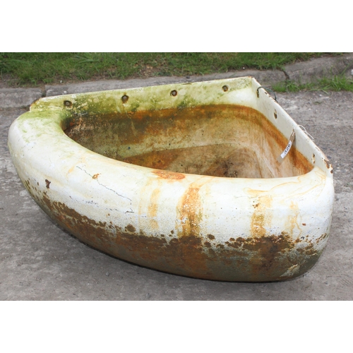 326 - A large vintage enamelled cast iron corner feeding or water trough, approx 59cm x 32cm tall