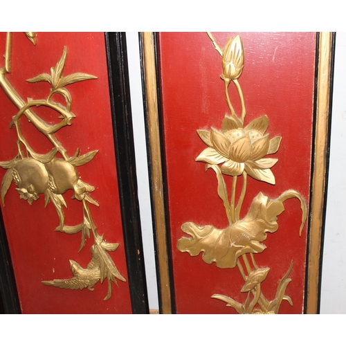 447 - Three Chinese rectangular wooden panels with applied gilt carvings, each panel approx 30cm x 90cm