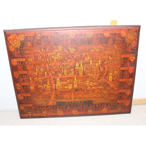 454 - Large wooden picture of Oxford City centre mainly depicting the university colleges and their Est. d... 