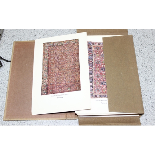 511 - Two 1930’s editions of portfolios of “Masterpieces of Oriental Rugs” containing 120 colour cards dep... 