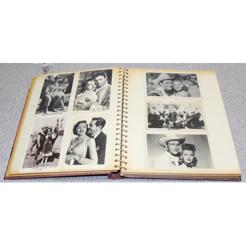 512 - Vintage photo album containing approx 70 postcards/photos of Hollywood film stars including Elvis, R... 