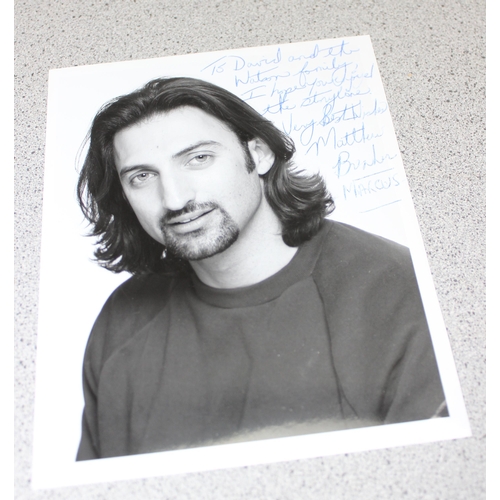 531 - Folder of autographed headshots, and other celebrity photos