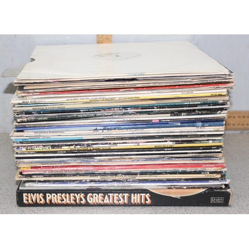 614 - Qty of vinyl record LP's to include The Beatles and Elvis Presley