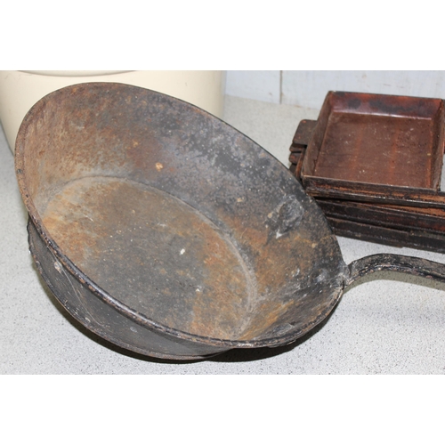 1749 - 4 vintage baking trays, a vintage enamel jam pan and a long handled frying skillet