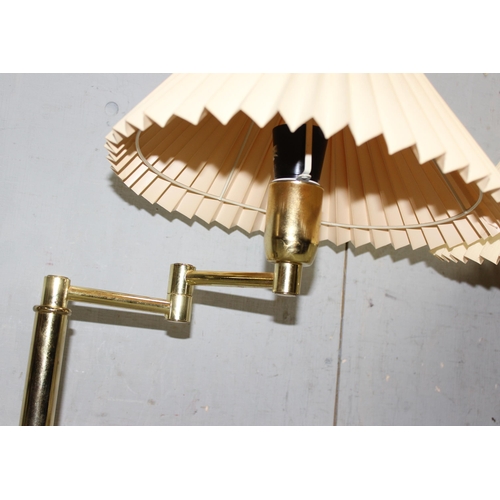 255 - Pair of brass swivel table lamps with shades