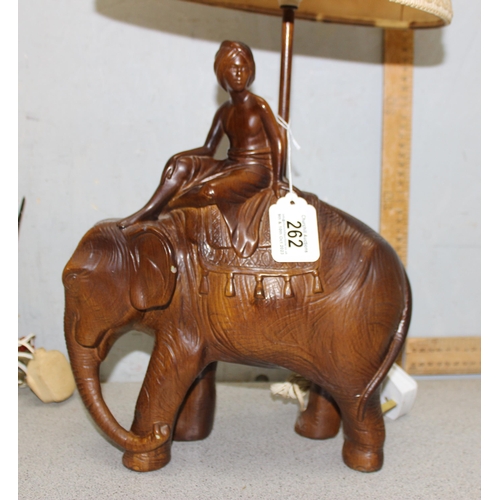 262 - Faux wood pottery lamp of an elephant with a Mahout and an Italian pottery lamps of a lady Elvis (2)