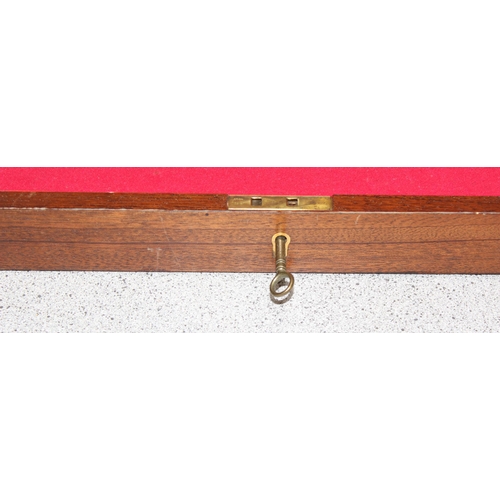 282 - Mahogany wooden box with red felt lining and key, approx 42cm x 24cm x 7cm