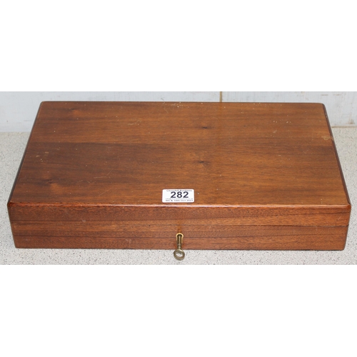 282 - Mahogany wooden box with red felt lining and key, approx 42cm x 24cm x 7cm