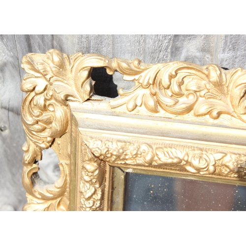 431 - Vintage gilt wood floral sprig framed mirror approx 67cm x 80cm