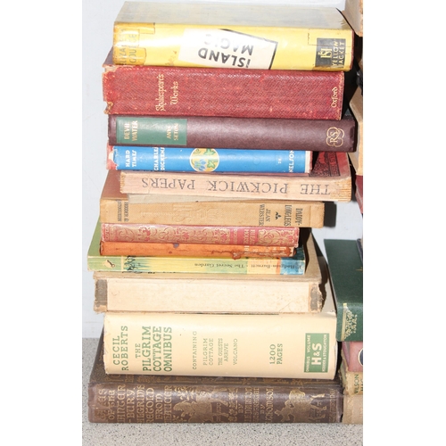 502 - Qty of mainly hardback books to include vintage copies of Winnie the Pooh and The Wind in the Willow... 