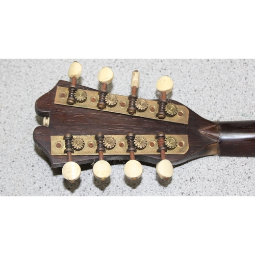 606 - Vintage mandolin in case by Paso le Angara & Paso le D'isanto