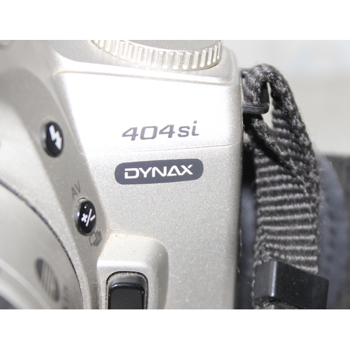 657 - Minolta 404si Dynax 35mm camera with 35-80 AF zoom lens with macro plus Minolta AF zoom and a 28-80m... 