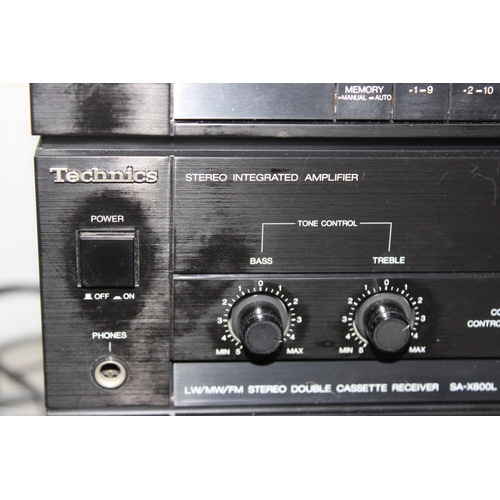 751 - Technics stereo system to include a turntable SL-J90, Synthesizer stereo tuner, stereo amp and doubl... 