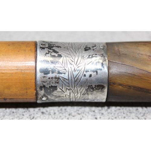 1050A - An antique silver mounted walking stick with Malacca shaft and horn handle, seemingly unmarked but X... 