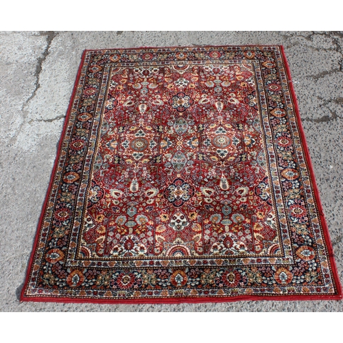 212 - A vintage Persian Bidjar rug of red ground, fine knot structure, approx 200cm x 146cm