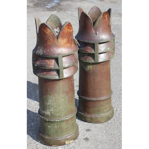 332 - A large pair of antique stoneware chimney pots with decorative tops, each approx 105cm tall