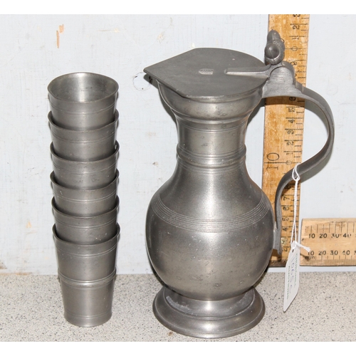 1065C - A German Etain Sigg Zinn pewter flagon and 6 shot glasses, approx 1.6kg gross