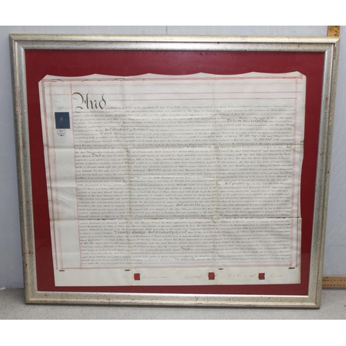 468 - A large 19th century framed vellum indenture or legal document for the watchmakers firm Thomas Hewit... 