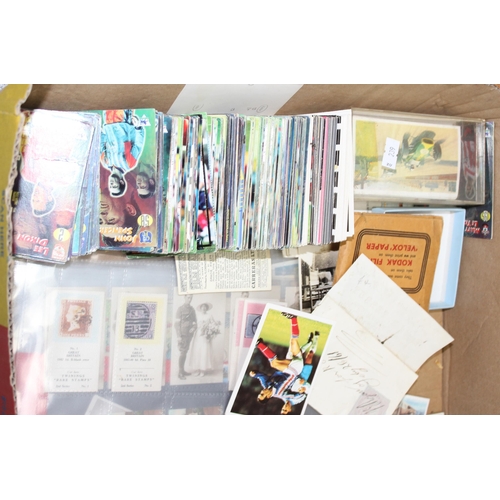 551 - Mixed lot of ephemera to include Merlin football cards, vintage photographs and film and cigarette c... 