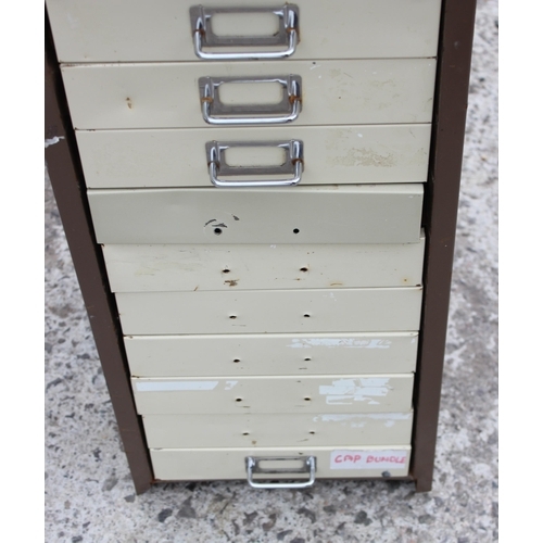 115 - A Bisley 15 drawer metal cabinet, approx 28cm wide x 38cm deep x 116cm tall