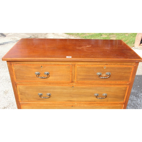 100 - An Edwardian 2/3 mahogany chest of drawers with drop handles, approx 107cm wide x 52cm deep x 111cm ... 