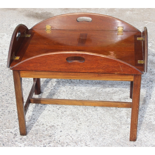 101 - A vintage folding mahogany butler's tray on stand, approx 90cm wide x 71cm deep x 56cm tall