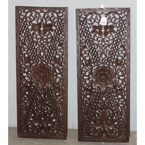 102 - A pair of Oriental carved wooden panels, approx 92cm x 35cm