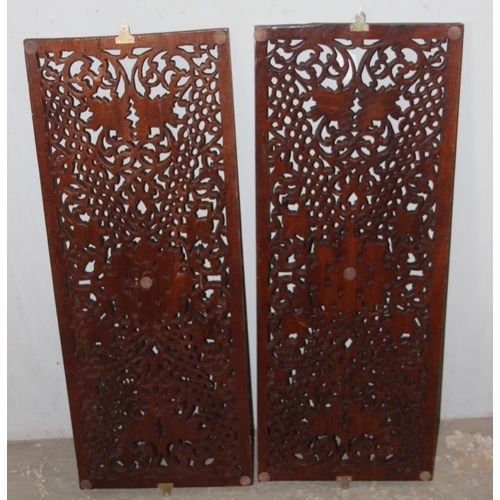 102 - A pair of Oriental carved wooden panels, approx 92cm x 35cm