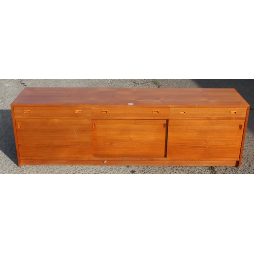 105 - A retro Scandinavian style 3 drawer and 3 door sideboard, seemingly unmarked, approx 184cm wide x 48... 