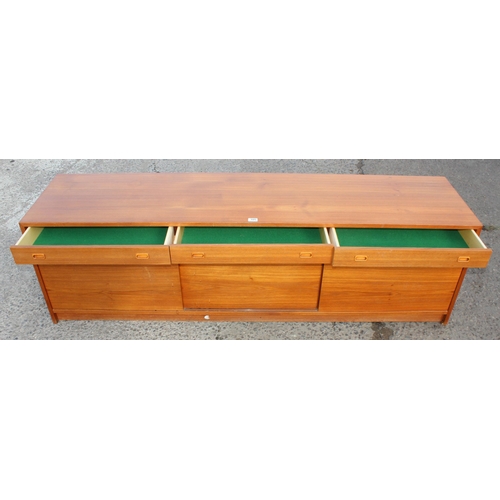 105 - A retro Scandinavian style 3 drawer and 3 door sideboard, seemingly unmarked, approx 184cm wide x 48... 