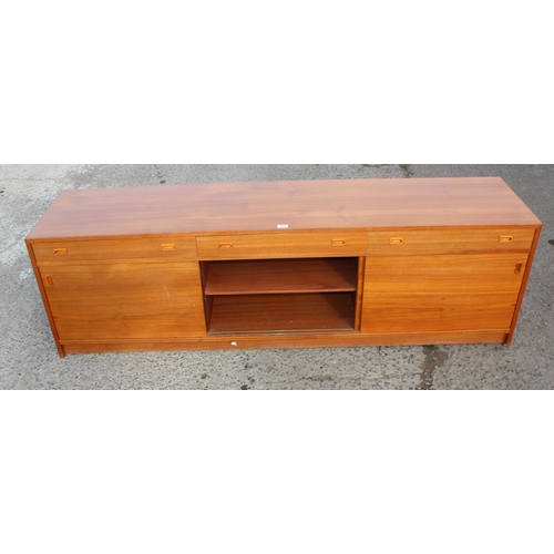 105 - A retro Scandinavian style 3 drawer and 3 door sideboard, seemingly unmarked, approx 184cm wide x 48... 