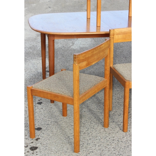 106 - A retro Nissen of Denmark extending dining table and 6 chairs, approx 247cm wide x 108cm deep x 73cm... 