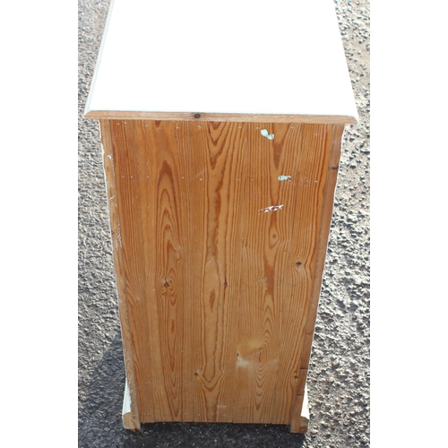 122 - A white painted pine wine rack with single drawer, approx 43cm wide x 43cm deep x 87cm tall