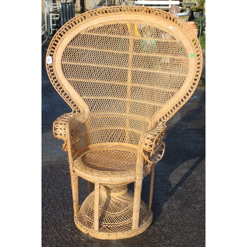 125 - A large vintage wicker peacock chair, approx 109cm wide x 56cm deep x 148cm tall