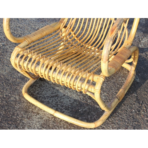 127 - A retro bamboo and wicker chair, strongly in the manner of Franco Albini, approx 59cm wide x 65cm de... 