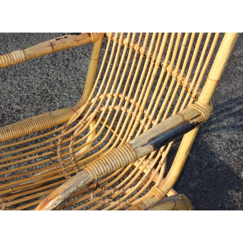 127 - A retro bamboo and wicker chair, strongly in the manner of Franco Albini, approx 59cm wide x 65cm de... 