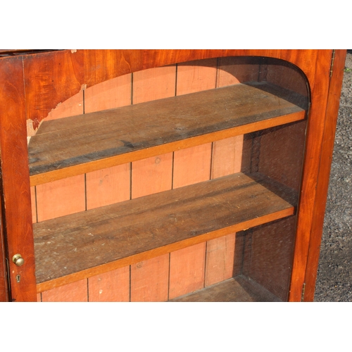 130 - An antique mahogany bookcase with glazed door, approx 105cm wide x 34cm deep x 107cm tall