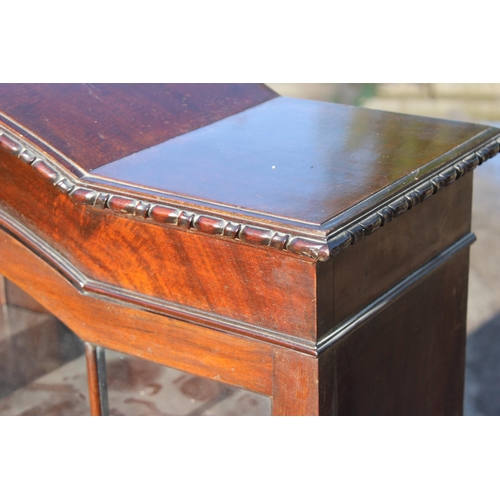 131 - An early 20th century mahogany bookcase with glazed doors, approx 93cm wide x 28cm deep x 123cm tall