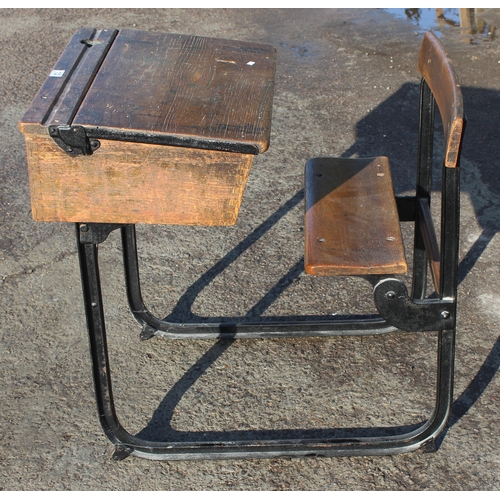 132 - A vintage oak school desk with iron frame by Kingfisher of West Bromwich, approx 62cm wide x 82cm de... 