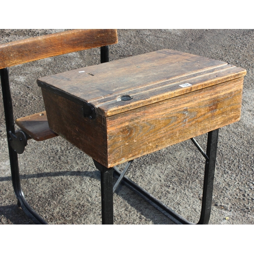 132 - A vintage oak school desk with iron frame by Kingfisher of West Bromwich, approx 62cm wide x 82cm de... 