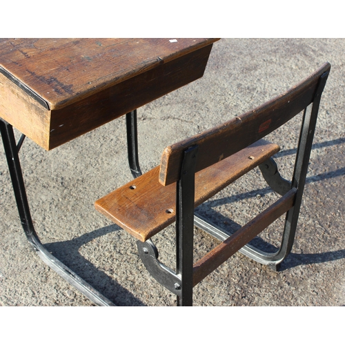 132 - A vintage oak school desk with iron frame by Kingfisher of West Bromwich, approx 62cm wide x 82cm de... 