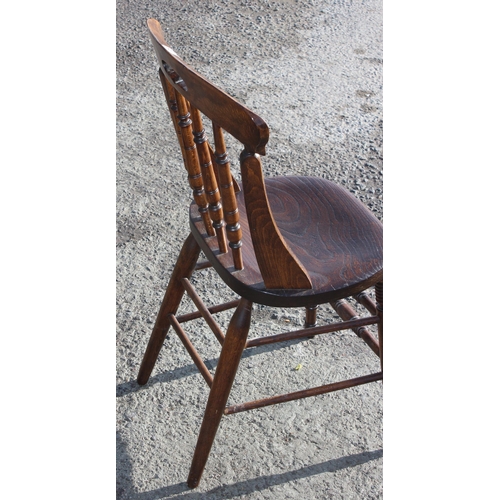 135 - A vintage elm seated chair with stick back, c.1900