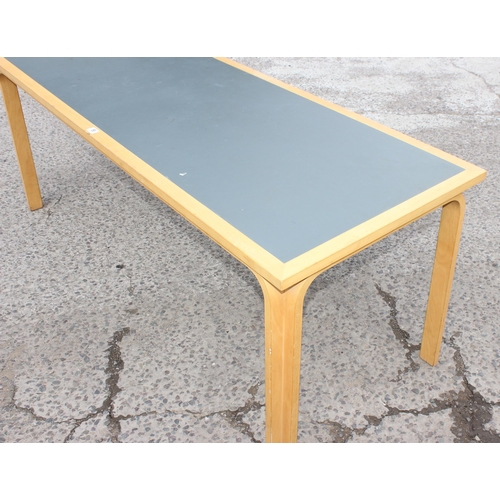 59 - Rud Thygesen and Johnny Sorensen for Magnus Olesen & Durup of Denmark, a grey topped desk or table w... 