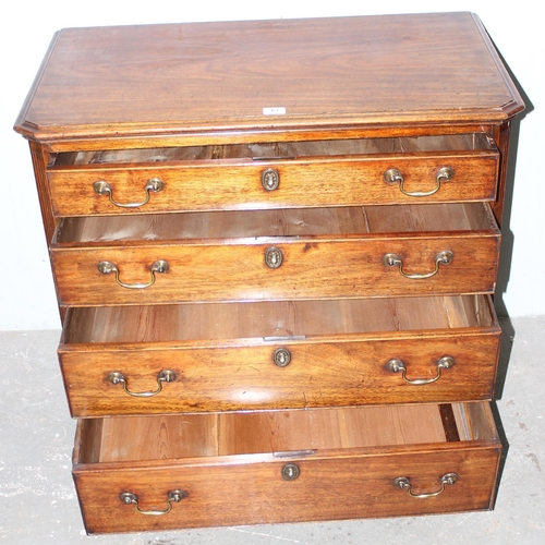 67 - A Georgian Mahogany 4 drawer chest of drawers with brass handles and unusual chamfered corners, appr... 